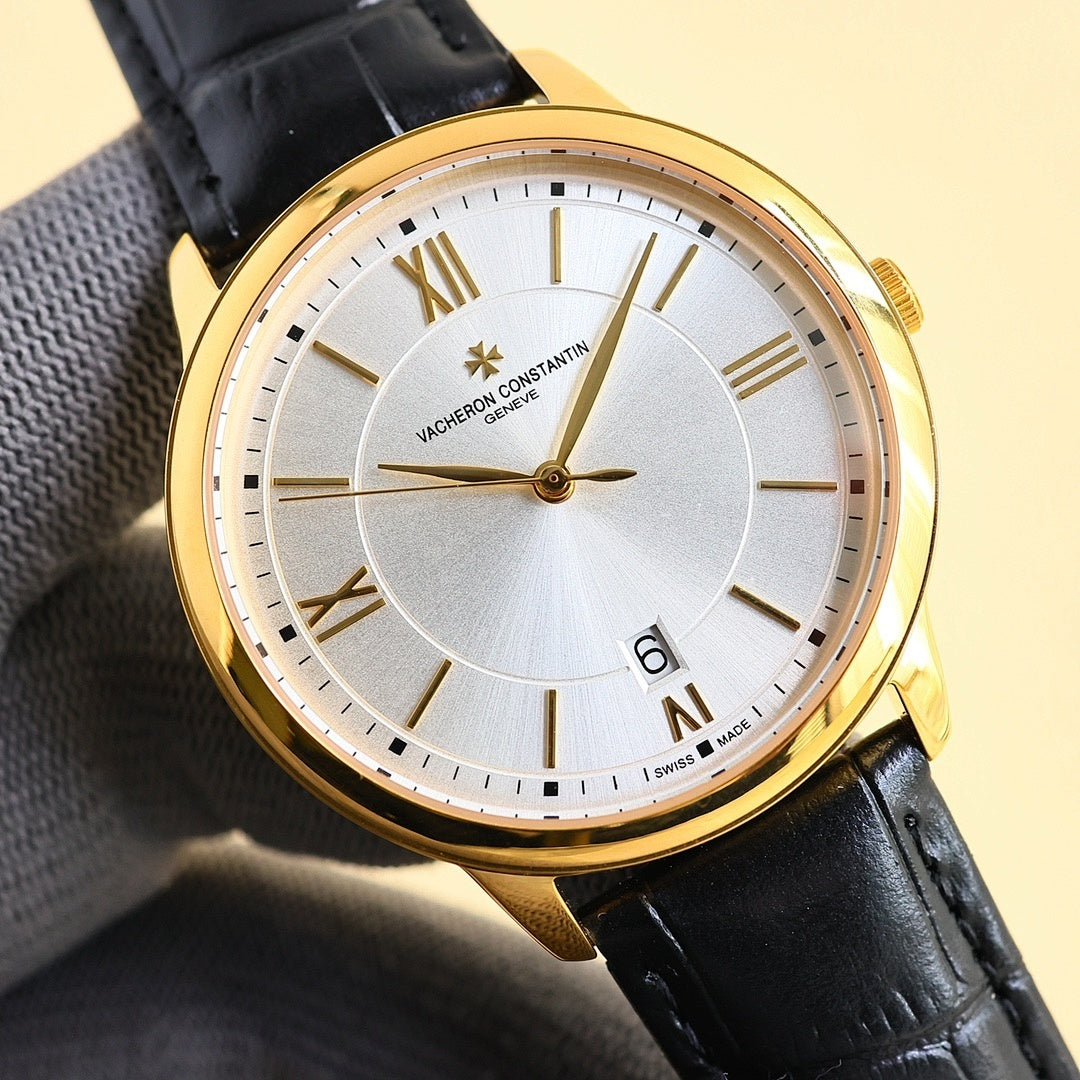 Gold-tone wristwatch with white dial, Roman numerals, date window, black leather strap.