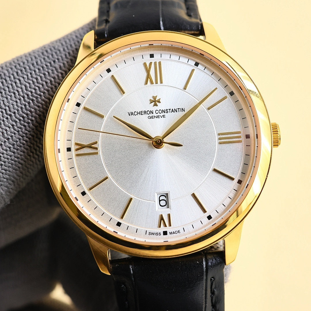 Gold-tone wristwatch with white dial, Roman numerals, date window, black leather strap.