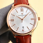 Rose gold-tone wristwatch with white dial, Roman numerals, date window, red leather strap.