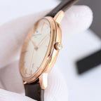 Vacheron Constantin rose gold wristwatch with black leather strap and crown detail