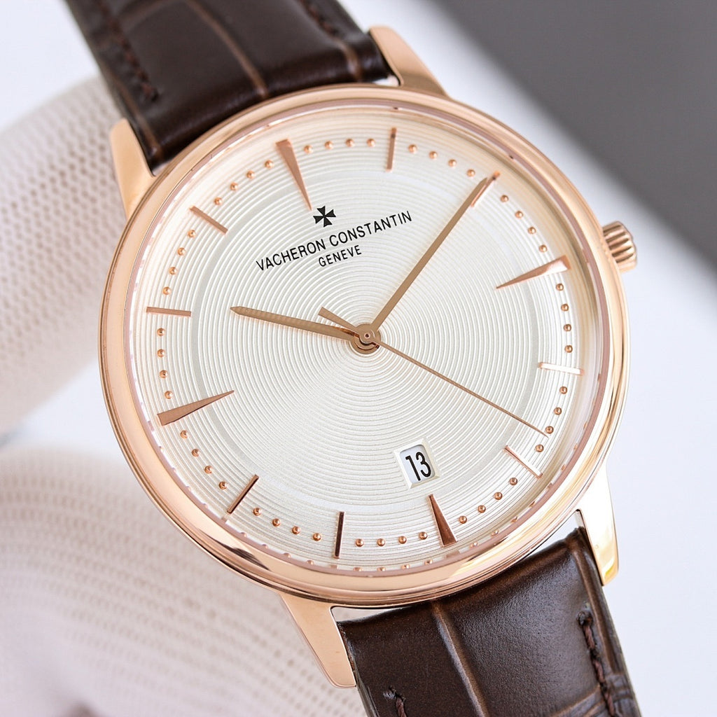 Vacheron Constantin wristwatch with rose gold case, white dial, black leather strap
