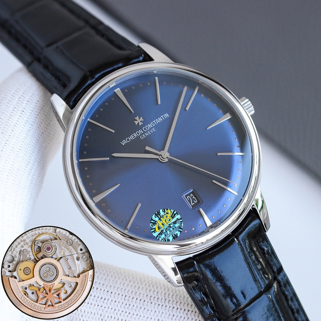 Wristwatch angled view with blue dial, black leather strap, and steel case