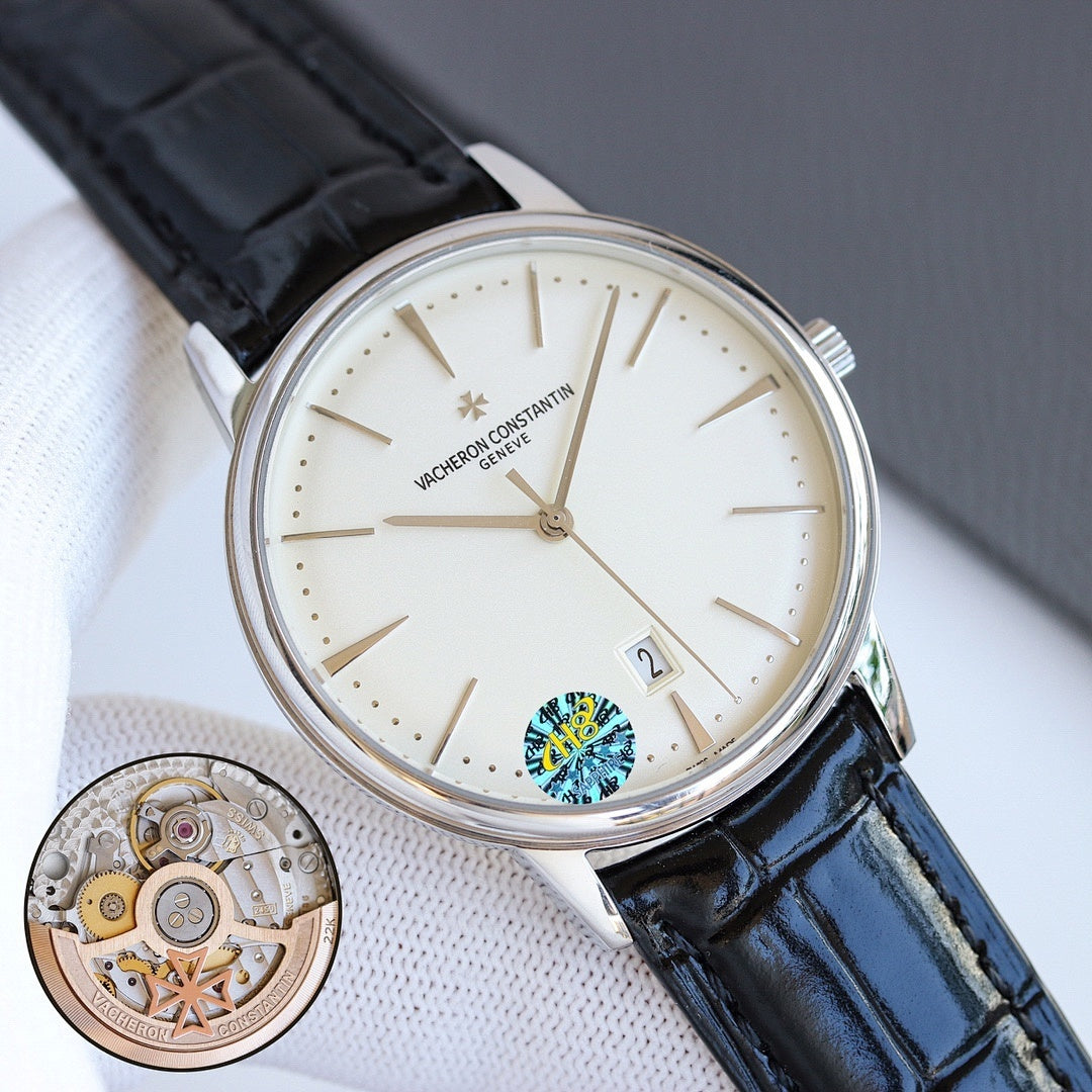 Wristwatch with white dial, black leather strap, steel case, and date window