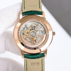 Rose-gold wristwatch with green leather strap, open caseback showing mechanical movement