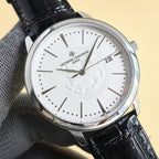 Steel wristwatch with white dial, baton markers, and black leather strap