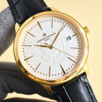 Gold wristwatch with white dial featuring dot track and black leather strap