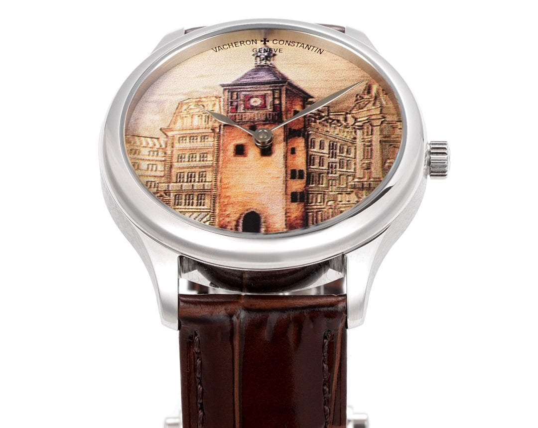 Vacheron Constantin wristwatch with brown leather strap, round silver case, illustrated building dial