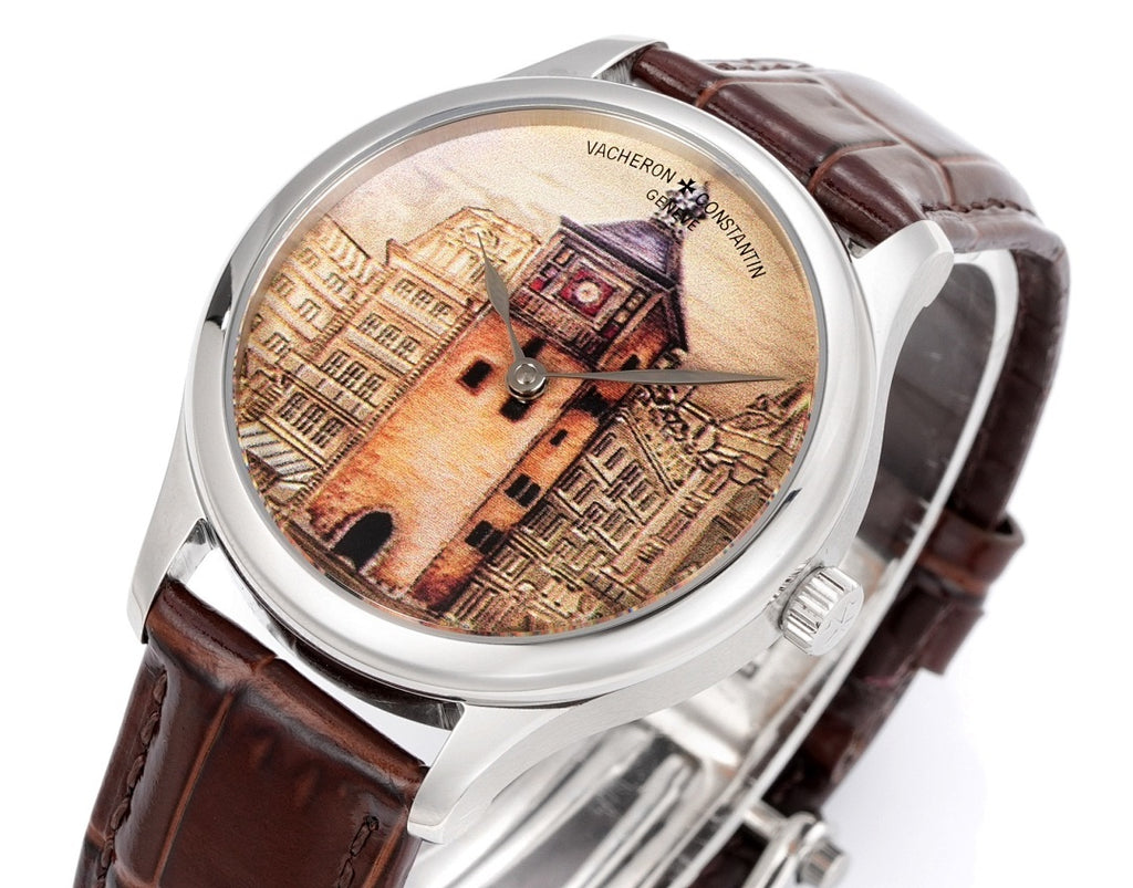 Vacheron Constantin wristwatch close-up with illustrated dial and brown leather strap, silver case
