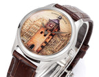 Vacheron Constantin wristwatch close-up with illustrated dial and brown leather strap, silver case