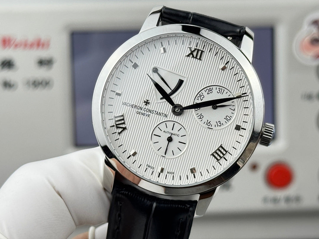 Vacheron Constantin wristwatch front view, black leather strap, silver case, white dial