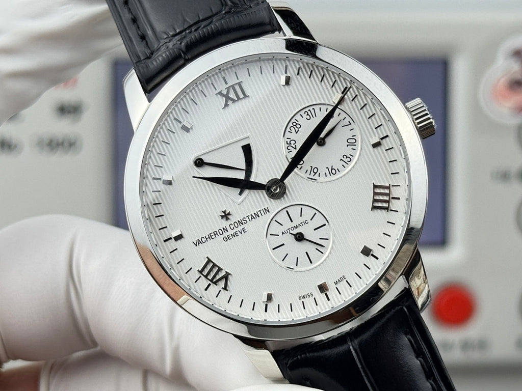 Vacheron Constantin wristwatch front close-up with black leather strap, silver case, Roman numerals