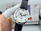 Vacheron Constantin wristwatch front view on wrist, black leather strap and white dial