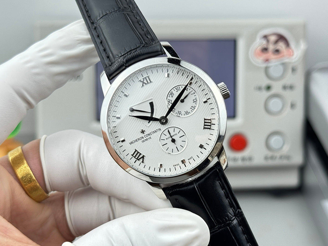 Vacheron Constantin wristwatch front view with black leather strap, silver case, white dial