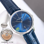 Vacheron Constantin watch with blue dial, silver case, blue leather strap and date window