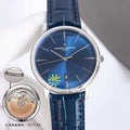 Vacheron Constantin watch with blue dial, silver case, black-blue leather strap, date window at 18