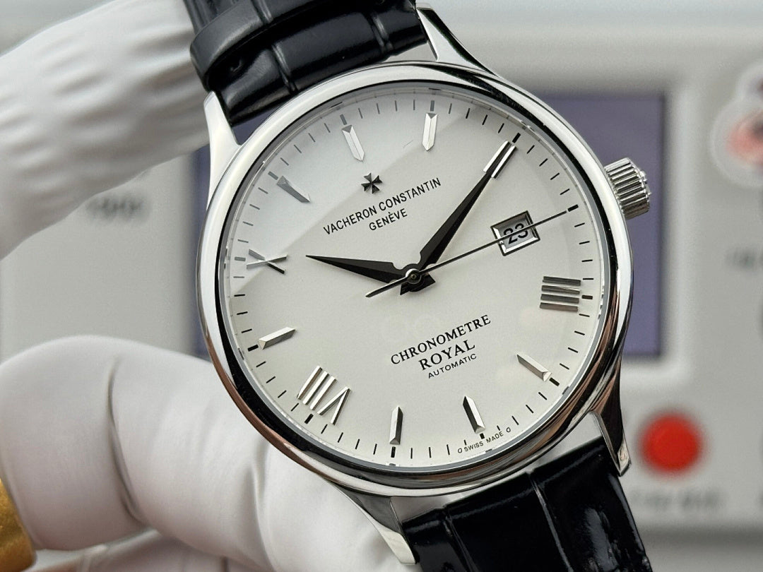 Chronometre Royal watch face close-up with white dial and black leather strap