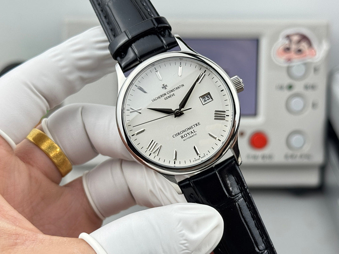 Chronometre Royal watch front angle with white dial, black leather strap, and date window