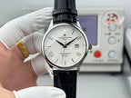 Chronometre Royal watch front view with white dial, black leather strap, and date window