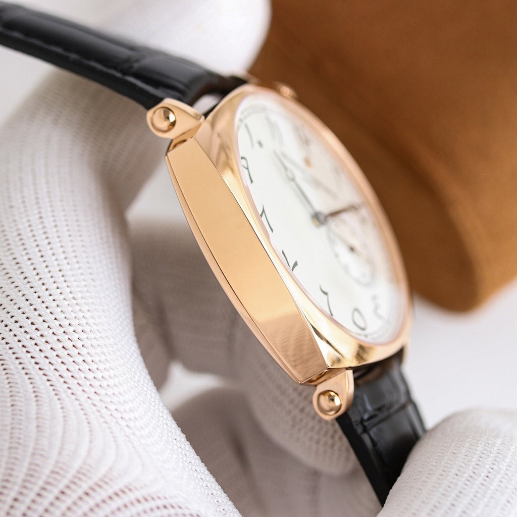 Vacheron Constantin wristwatch profile view, gold-tone case with black leather strap