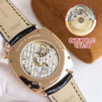 Vacheron Constantin wristwatch with open caseback, visible mechanical movement, black strap
