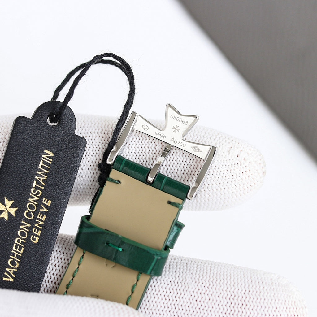 Vacheron Constantin leather-strap watch with green band, metal buckle, and clasp