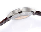 Vacheron Constantin wristwatch underside view with silver caseback and brown strap