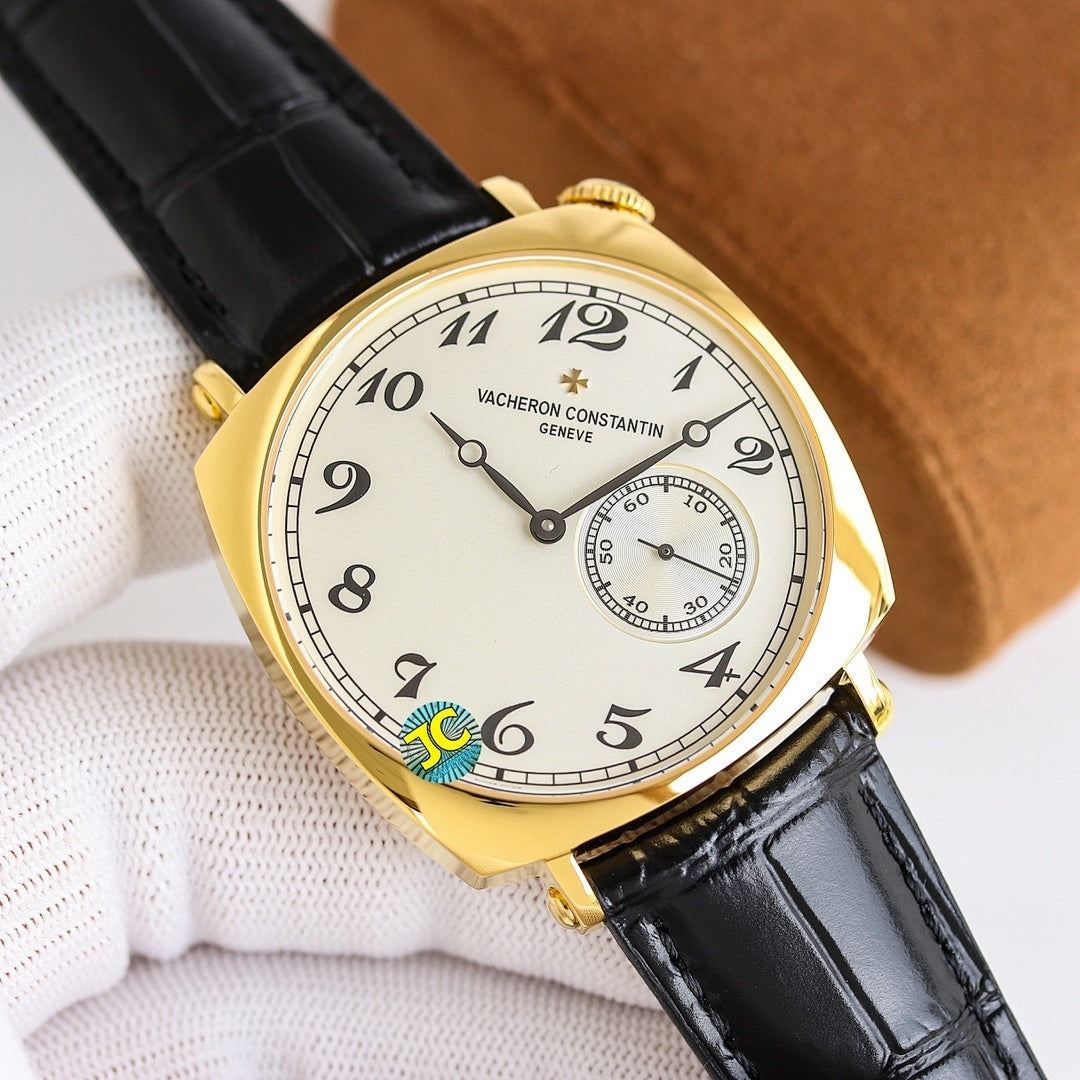 Vacheron Constantin watch with gold-tone case, white dial, black leather strap.