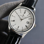 Vacheron Constantin wristwatch with white dial, silver case, black leather strap, date window 29