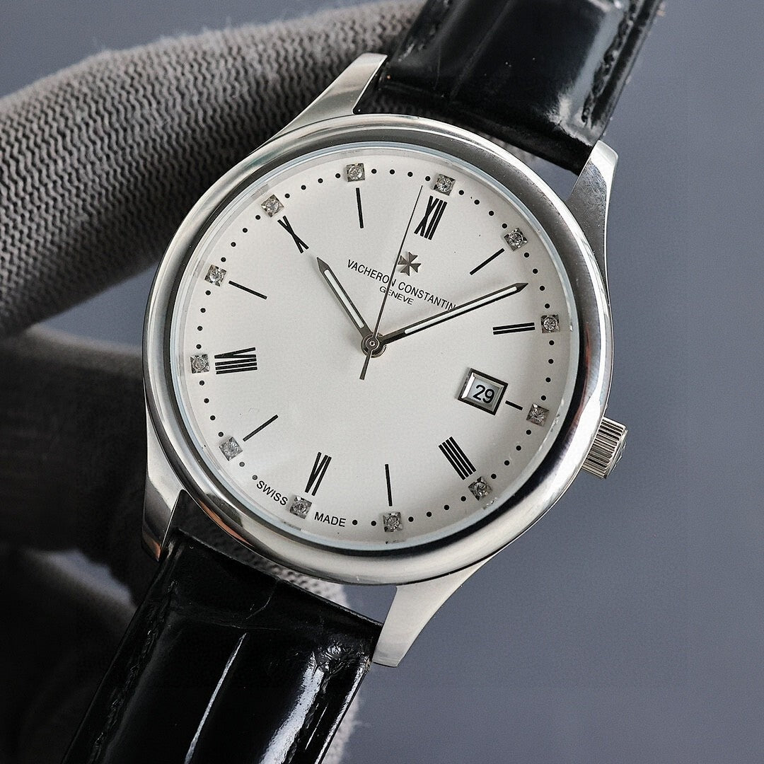 Vacheron Constantin wristwatch with white dial, silver case, black leather strap, date window 29