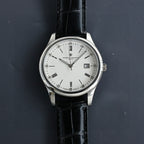 Vacheron Constantin wristwatch with white dial, silver case, black leather strap, Roman hour marks