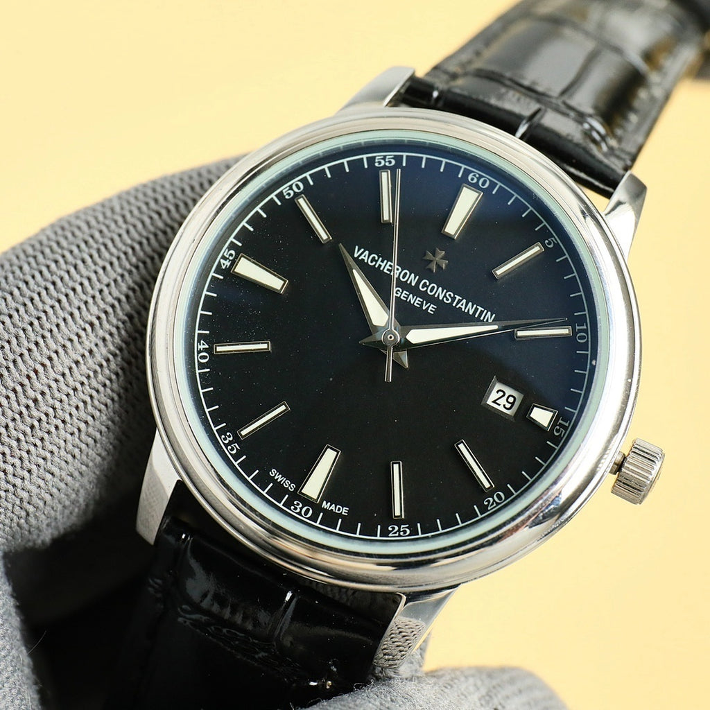 Vacheron Constantin wristwatch with black dial, silver case, black leather strap, date 29