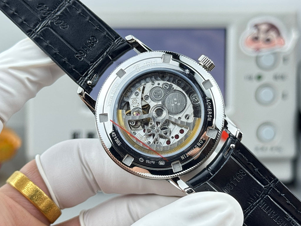 Vacheron Constantin watch with exposed caseback and black leather strap
