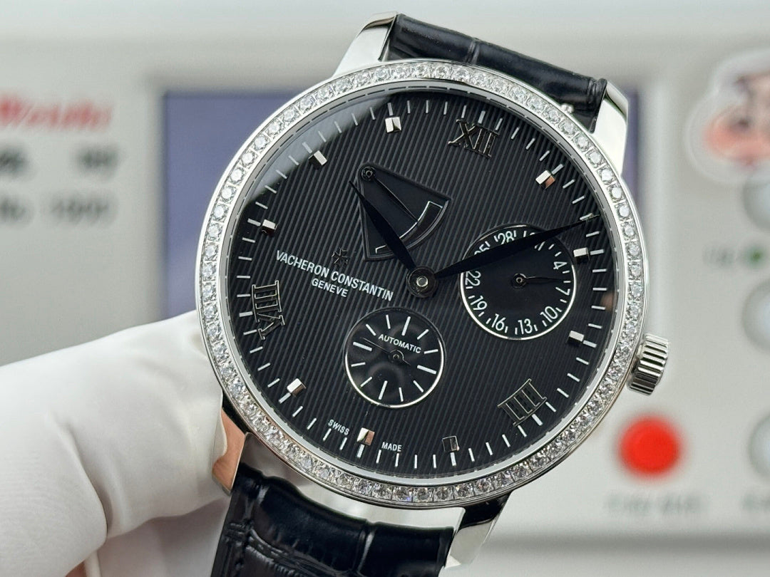 Vacheron Constantin wristwatch with black dial, roman numerals, and black leather strap