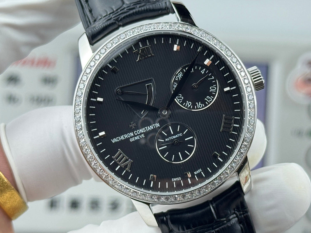 Vacheron Constantin watch close-up with black dial, roman numerals, and black leather strap