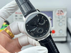 Vacheron Constantin watch with black dial, silver bezel, and black leather strap in hand