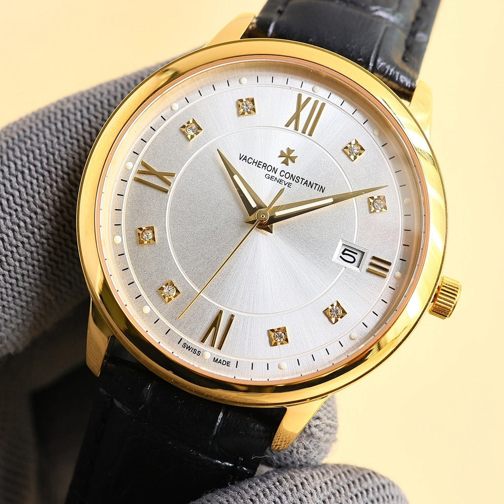 Wristwatch with gold case, white dial, diamond markers, black leather strap.
