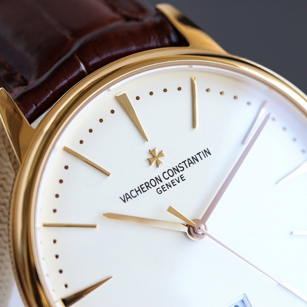 Vacheron Constantin watch close-up of white dial with star logo and gold hour markers