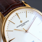 Vacheron Constantin watch close-up of white dial with star logo and gold hour markers
