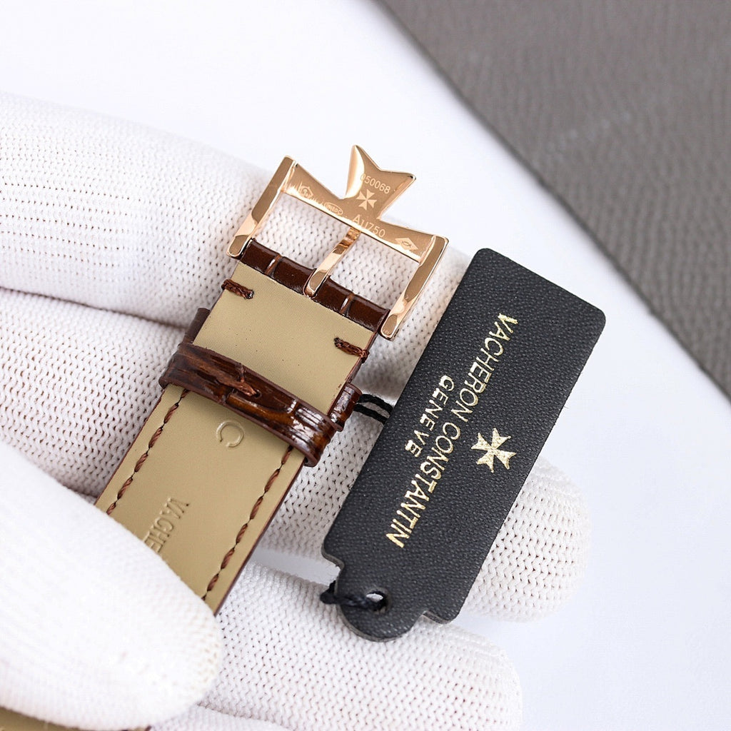 Vacheron Constantin watch with clasp and caseback, dark leather strap with pin buckle