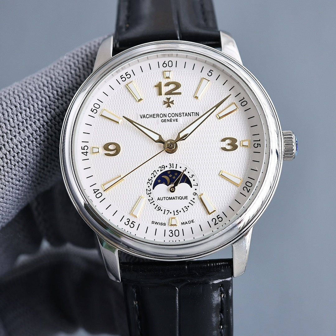 Automatic wristwatch, silver case, cream dial, black leather strap with subdial