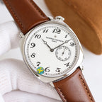 Wristwatch with brown leather strap and white dial, visible subdial at right and roman numeral hour marks