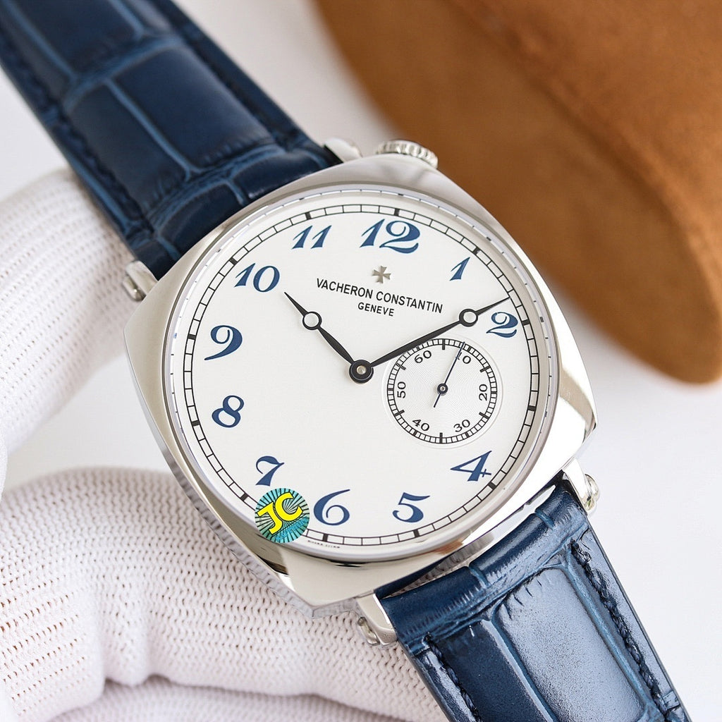 Wristwatch with blue leather strap and white dial, date-style subdial with track markings