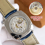 Wristwatch caseback showing mechanical movement through clear window, blue leather strap