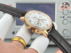 Luxury wristwatch angled view with white dial, rose-gold case, black leather strap, gem bezel.