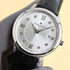 Dress watch with light dial, diamond markers, Roman numerals, date window 5, black leather strap