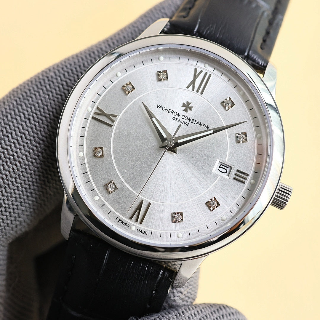 Dress watch with light dial, diamond markers, Roman numerals, date window 5, black leather strap