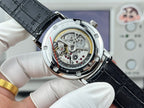 Vacheron Constantin watch caseback with exposed movement, silver case, black leather strap.