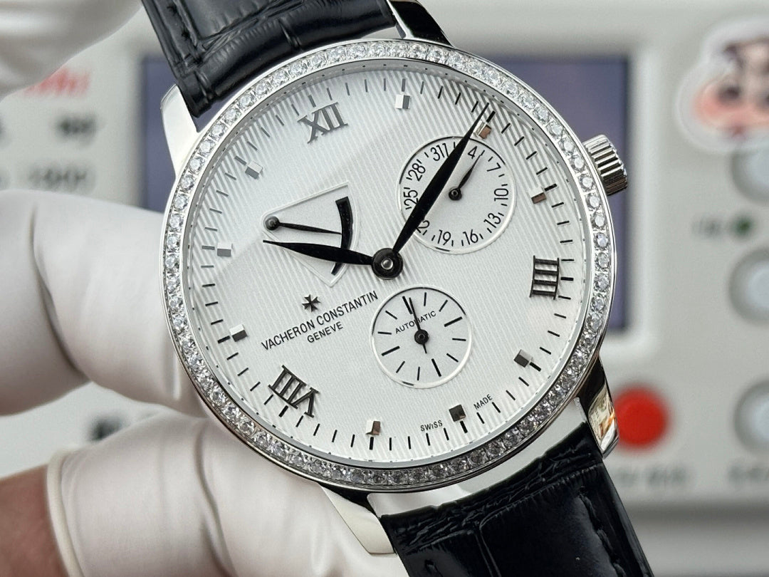 Vacheron Constantin wristwatch close-up with white dial, Roman numerals, black leather strap.