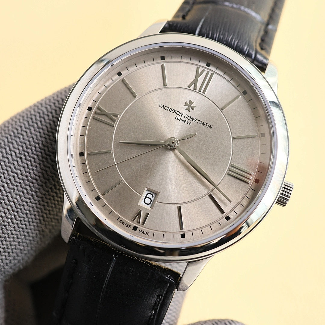 Vacheron Constantin watch with black leather strap, silver dial, Roman numerals, date at 6