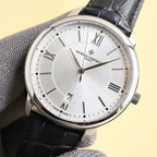 Vacheron Constantin watch with black leather strap, light dial, Roman numerals, date at 7